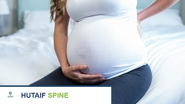 آلام الظهر أثناء الحمل: دليل شامل من الأستاذ الدكتور محمد هطيف